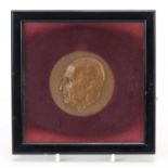 Robert Soupault commemorative bronze medallion housed in a glazed frame, dated 1968 and Antony