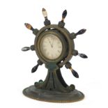 19th century gilt bronze ship's wheel design mantle clock with Scottish agate handles and Roman