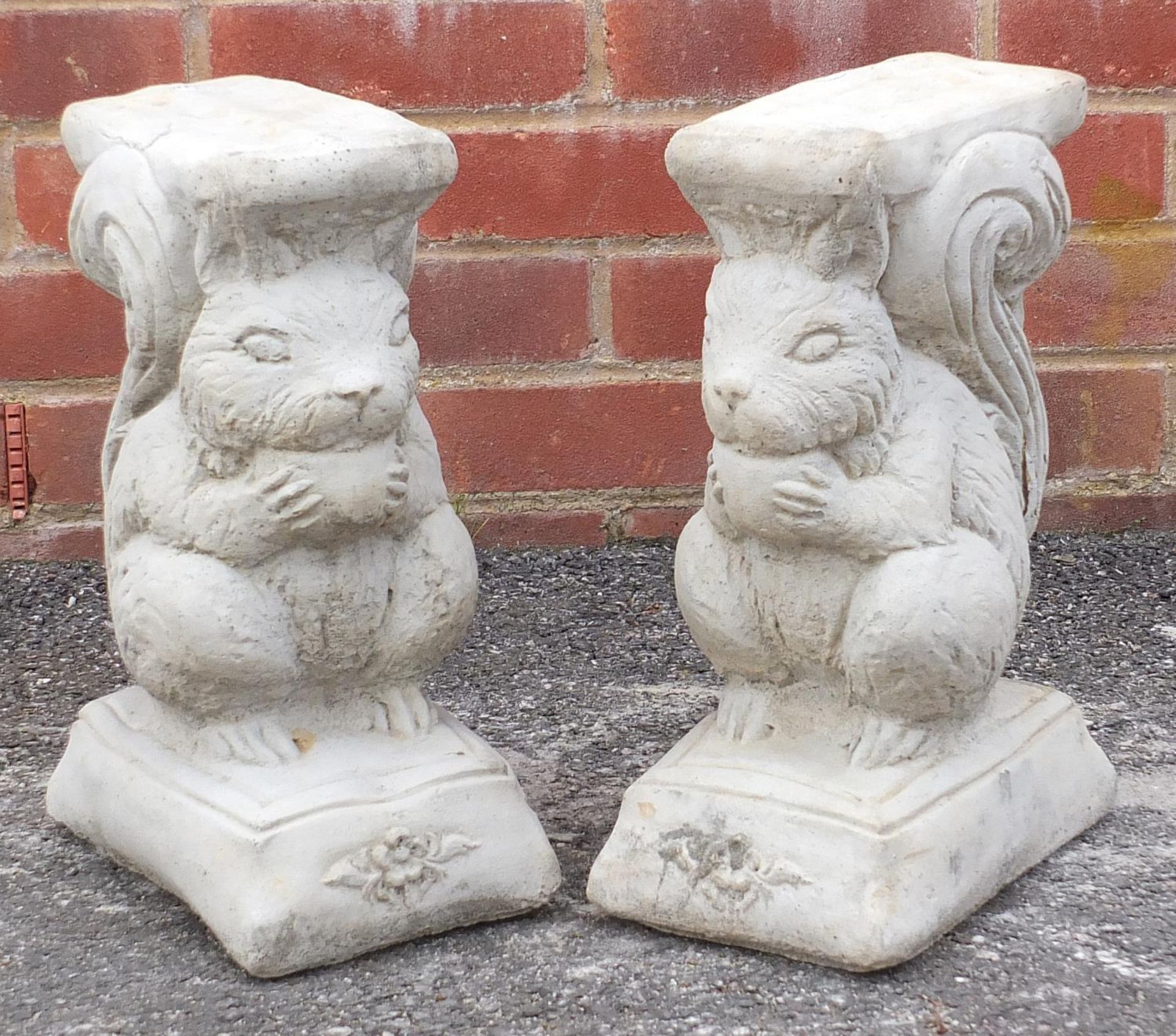 Pair of stoneware garden squirrels :
