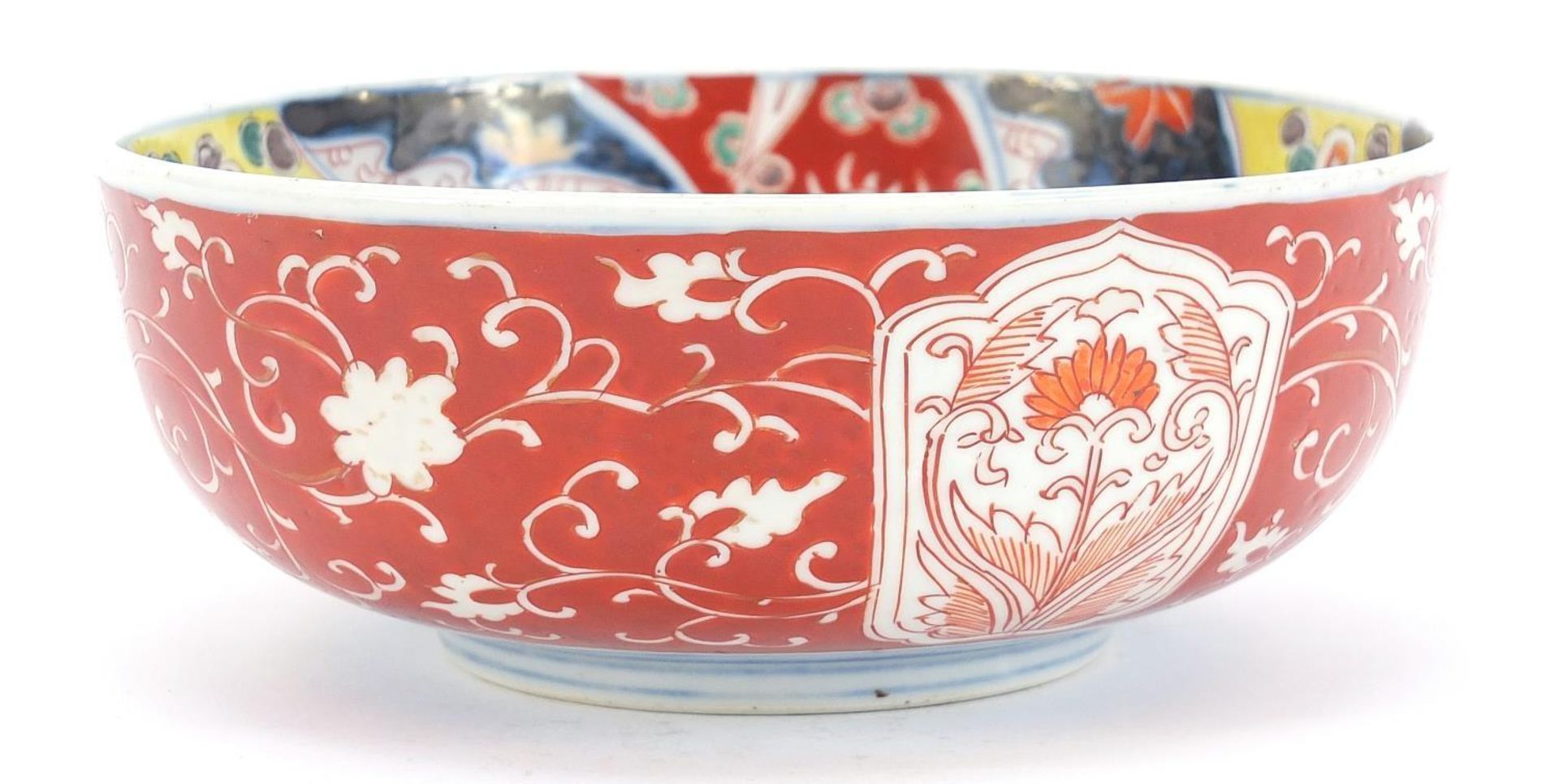 Japanese Imari comprising a pair of chargers hand painted with flowers and landscapes and a bowl, - Image 7 of 11