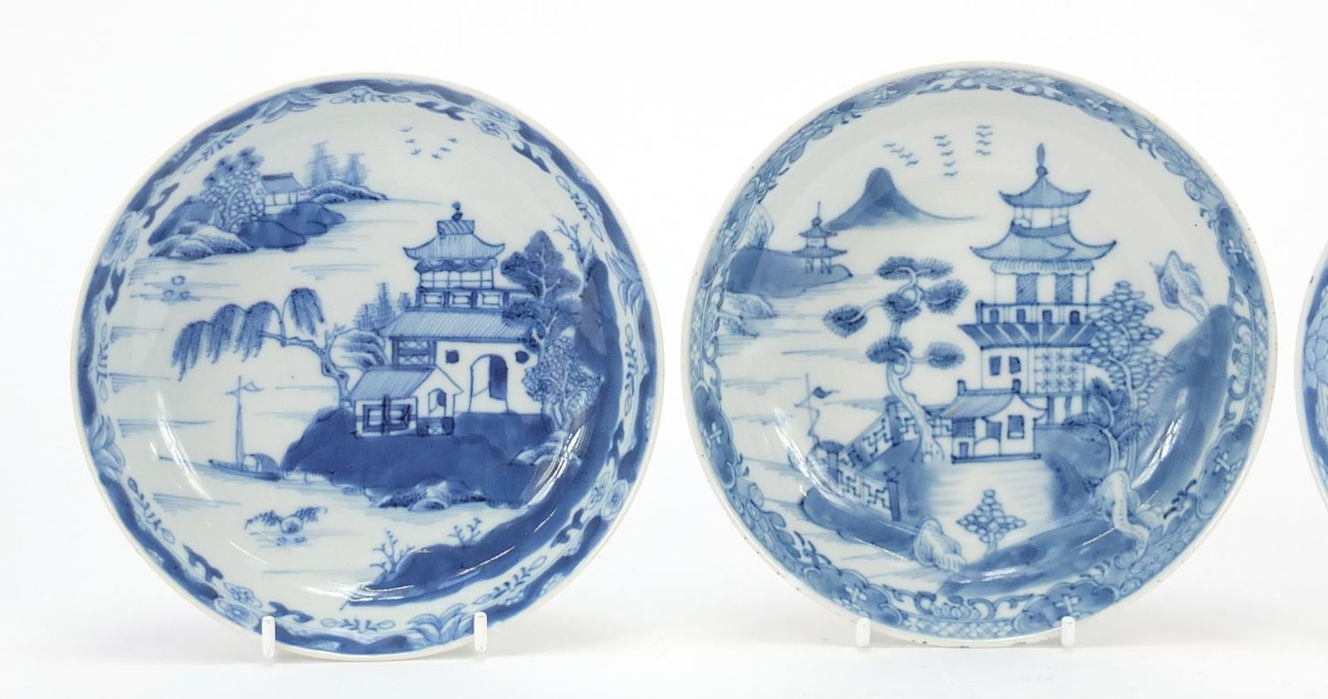 Three Chinese blue and white porcelain dishes each hand painted with a pagoda and river landscape, - Image 2 of 4