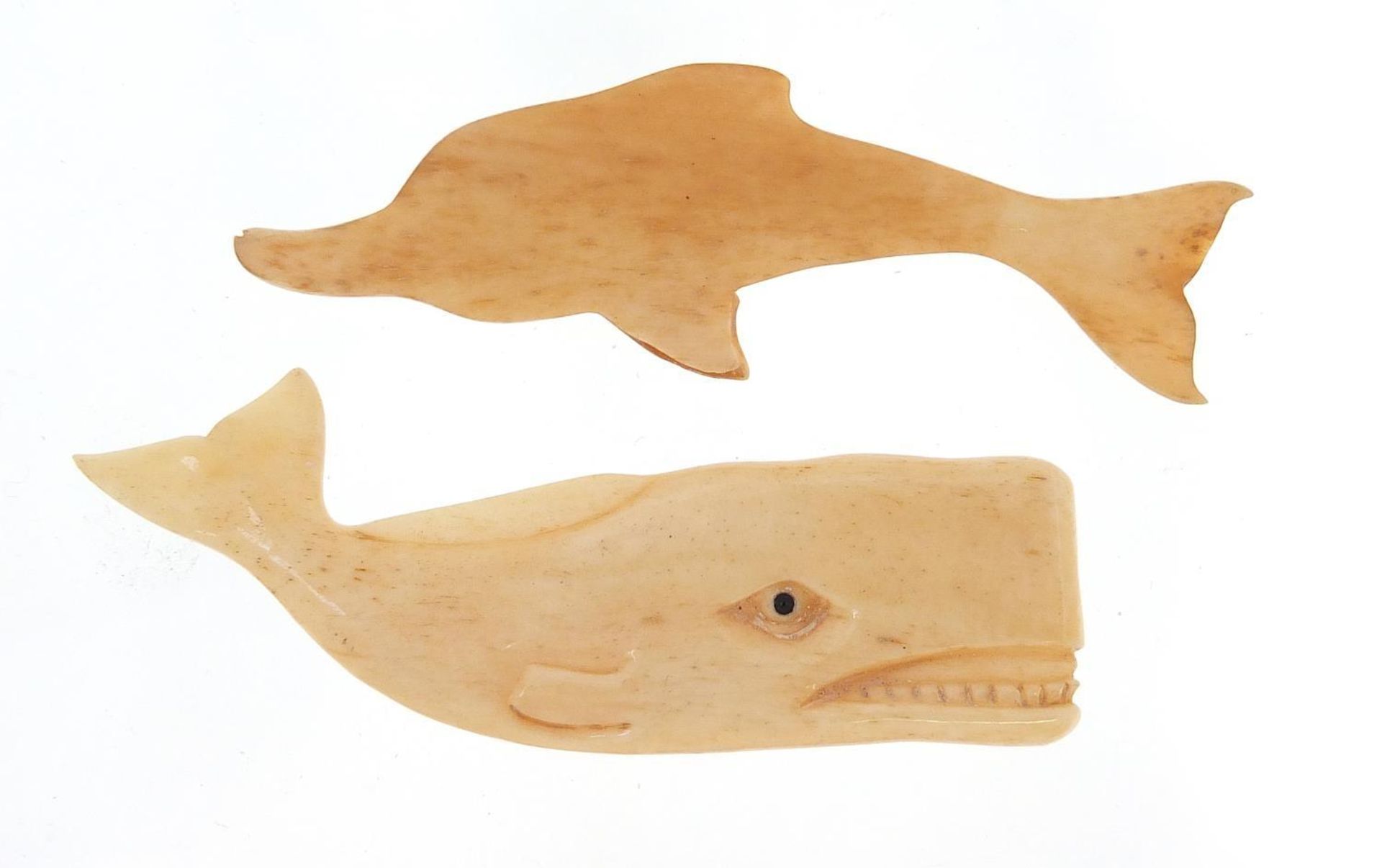 Two Scrimshaw style bone carvings of a whale and dolphin, the largest 8cm in length : - Bild 2 aus 2