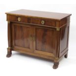 Early 19th century mahogany side cabinet with gilt metal mounts on paw feet, 85cm H x 107.5cm W x