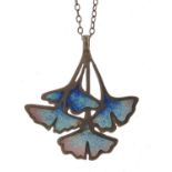 Art Nouveau style unmarked silver and enamel pendant on a silver necklace, the pendant 3.5cm high,