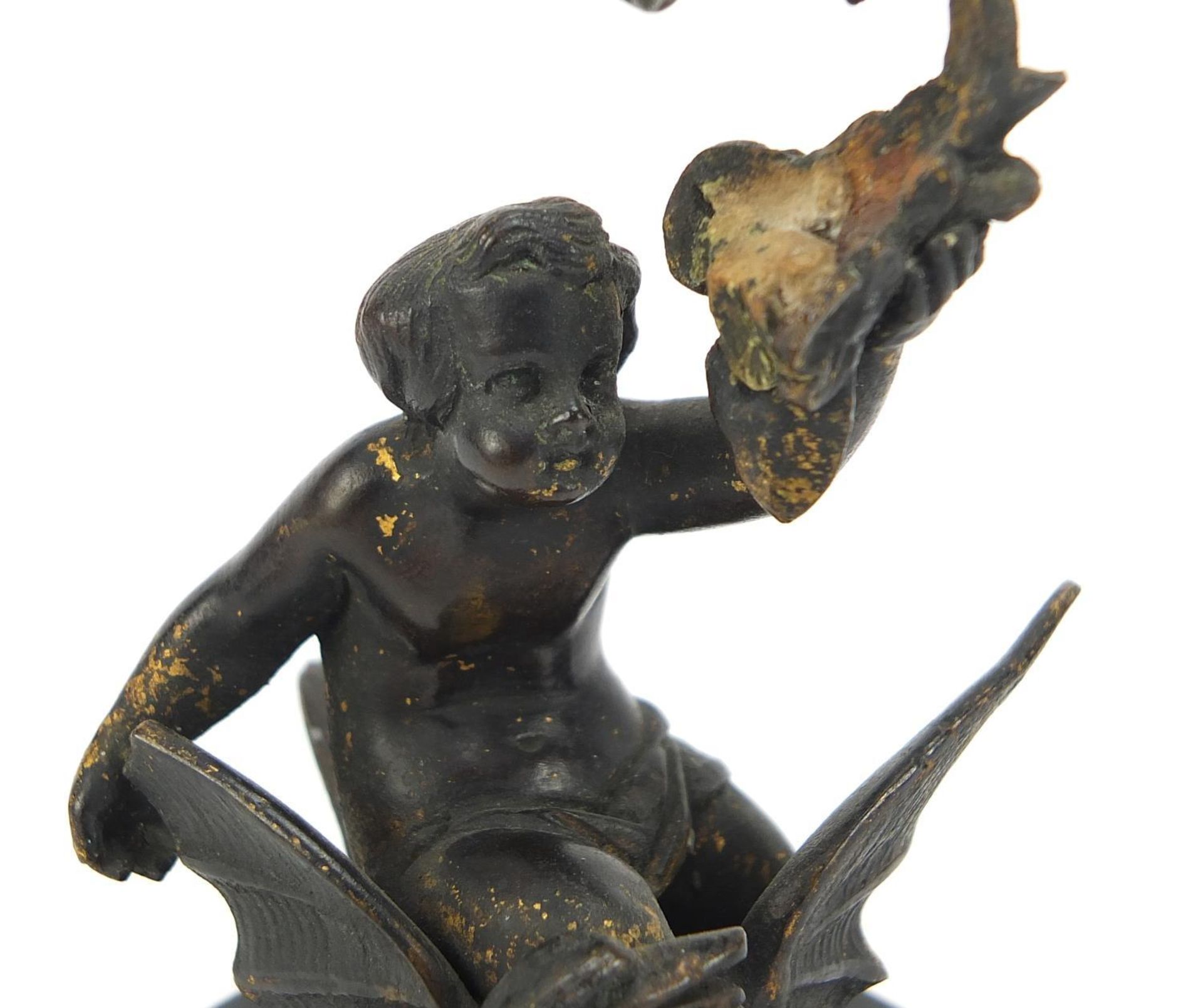 Cold painted bronze figure of Putti on a swan raised on an oval slate base, 11cm high : - Image 2 of 5