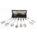 Nine silver teaspoons including some with apostle terminals, various hallmarks, the largest 11cm