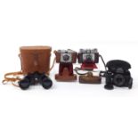 Vintage and later cameras and binoculars comprising Praktica, Ilford and Viper :