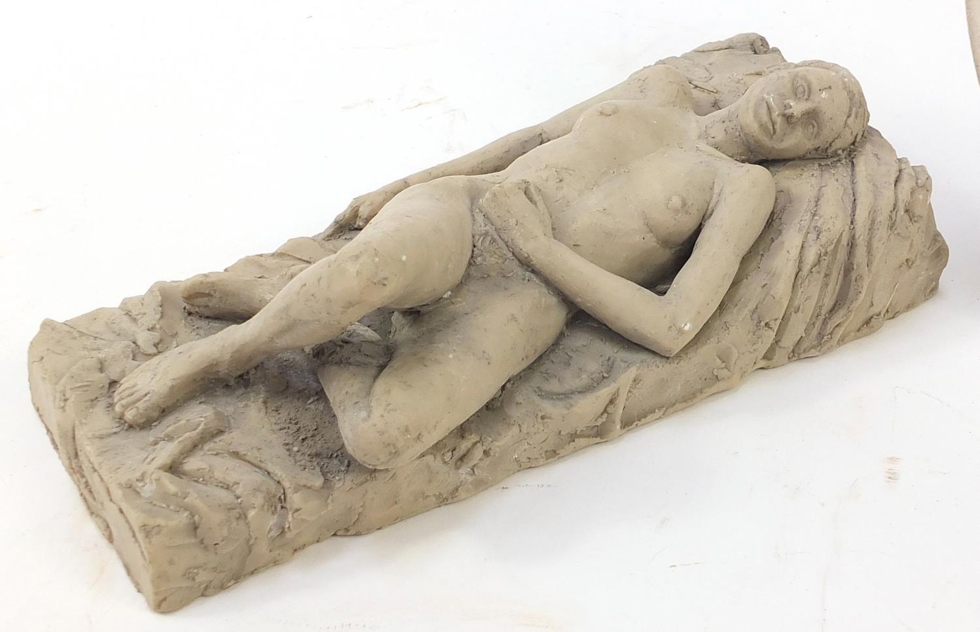 Modernist sculpture of a reclining nude female and a plaster roundel of a faun, the largest 29cm - Image 2 of 5