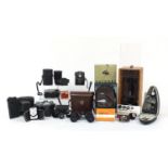 Optical equipment including Zenit-B camera, microscope, Bell & Howell and lenses :