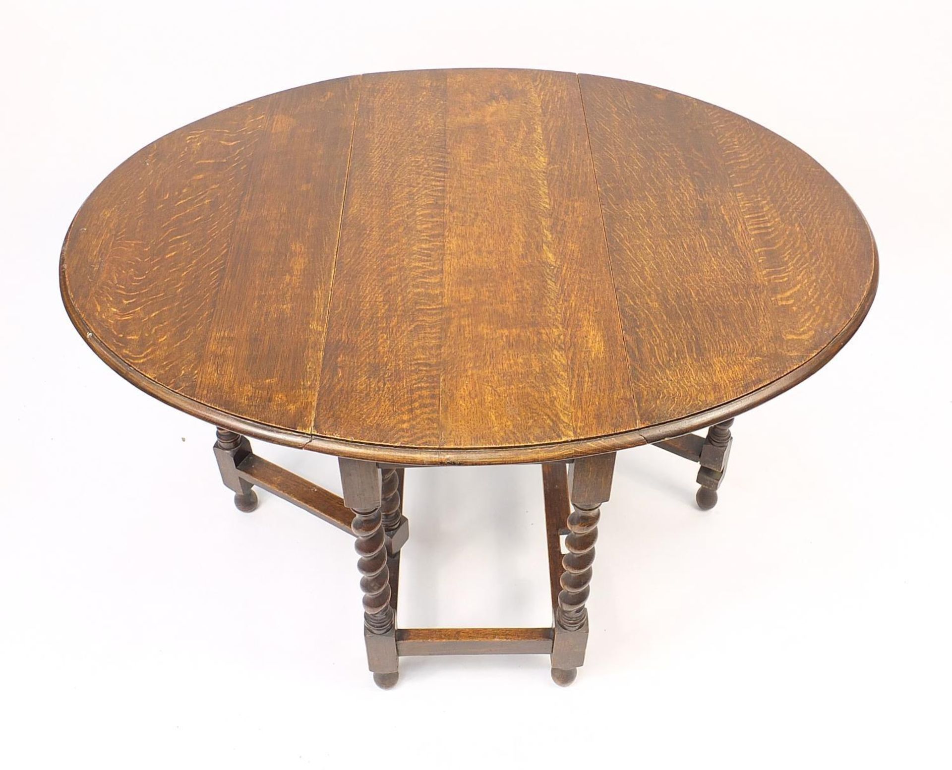 Oval oak gate leg table with barley twist legs, 73cm H x x 92cm W x 42cm D when closed : - Image 3 of 4