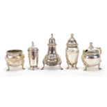 Five silver cruet items including Adie Brothers Ltd, the largest 8cm high, total 240.4g :