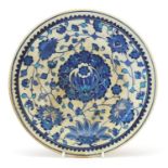 Turkish Kutahya plate hand painted with flowers, possibly Ottoman, 21.5cm in diameter :