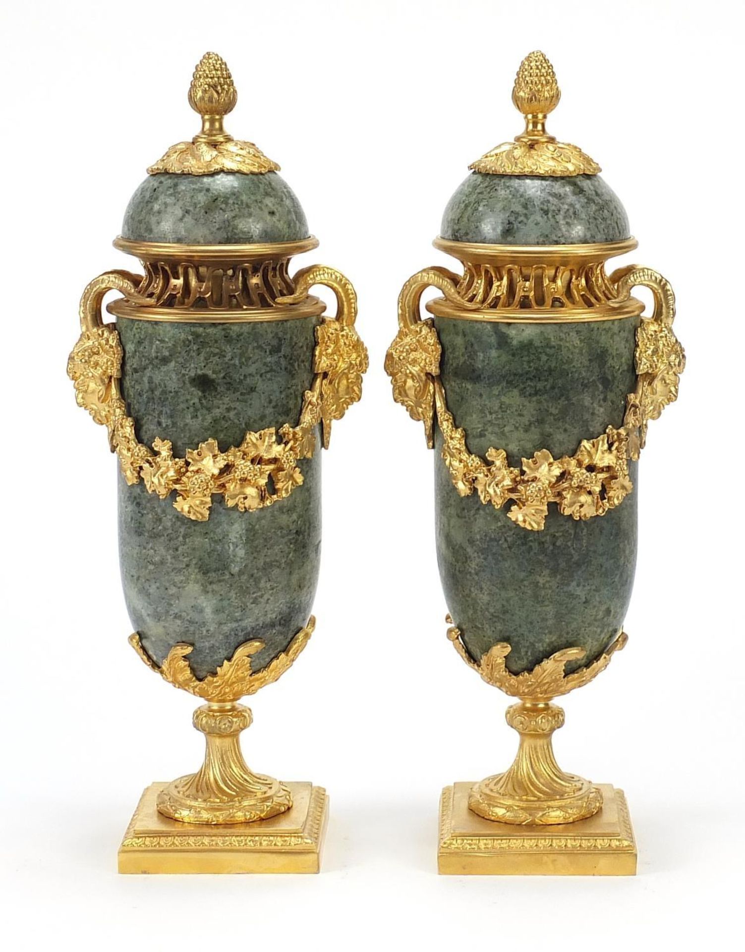 Pair of French gilt bronze and marble pedestal vases and covers with faun head handles, each 32cm