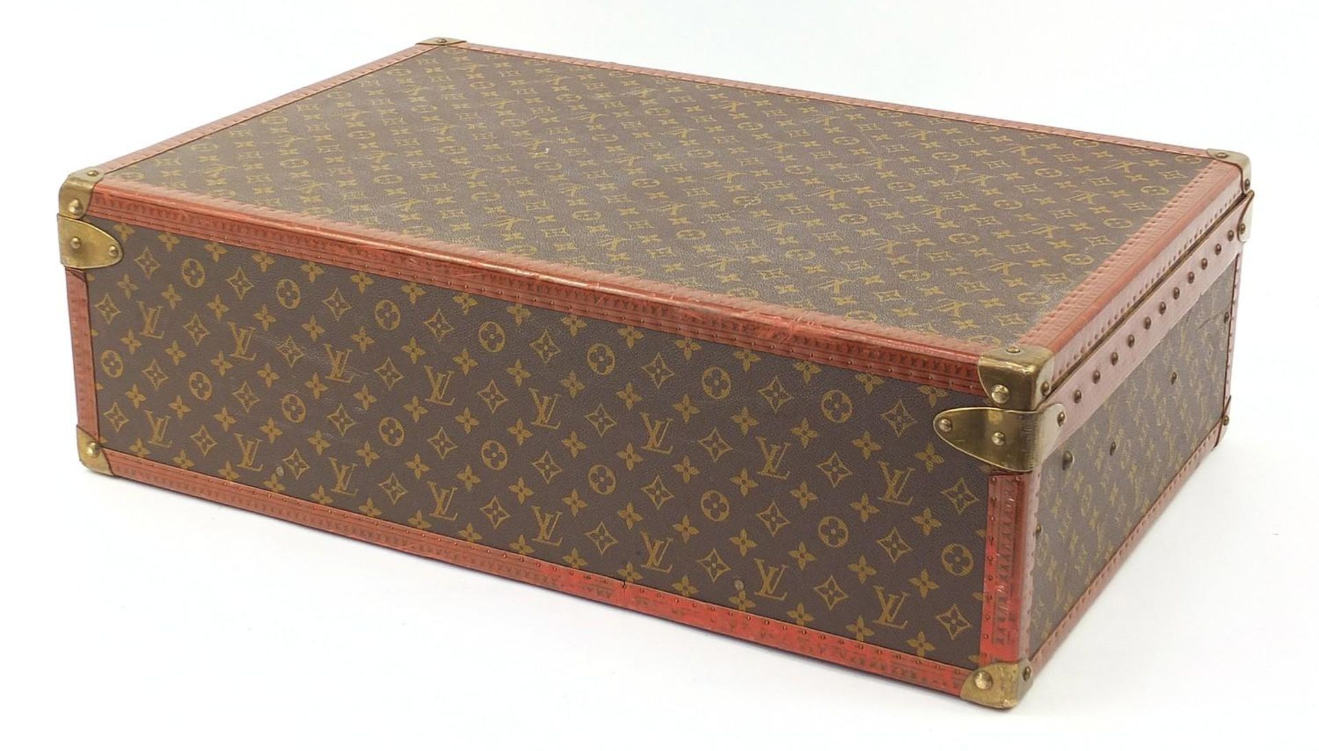 Louis Vuitton, early 20th century suitcase with lift out tray, various impressed marks to the - Image 8 of 8