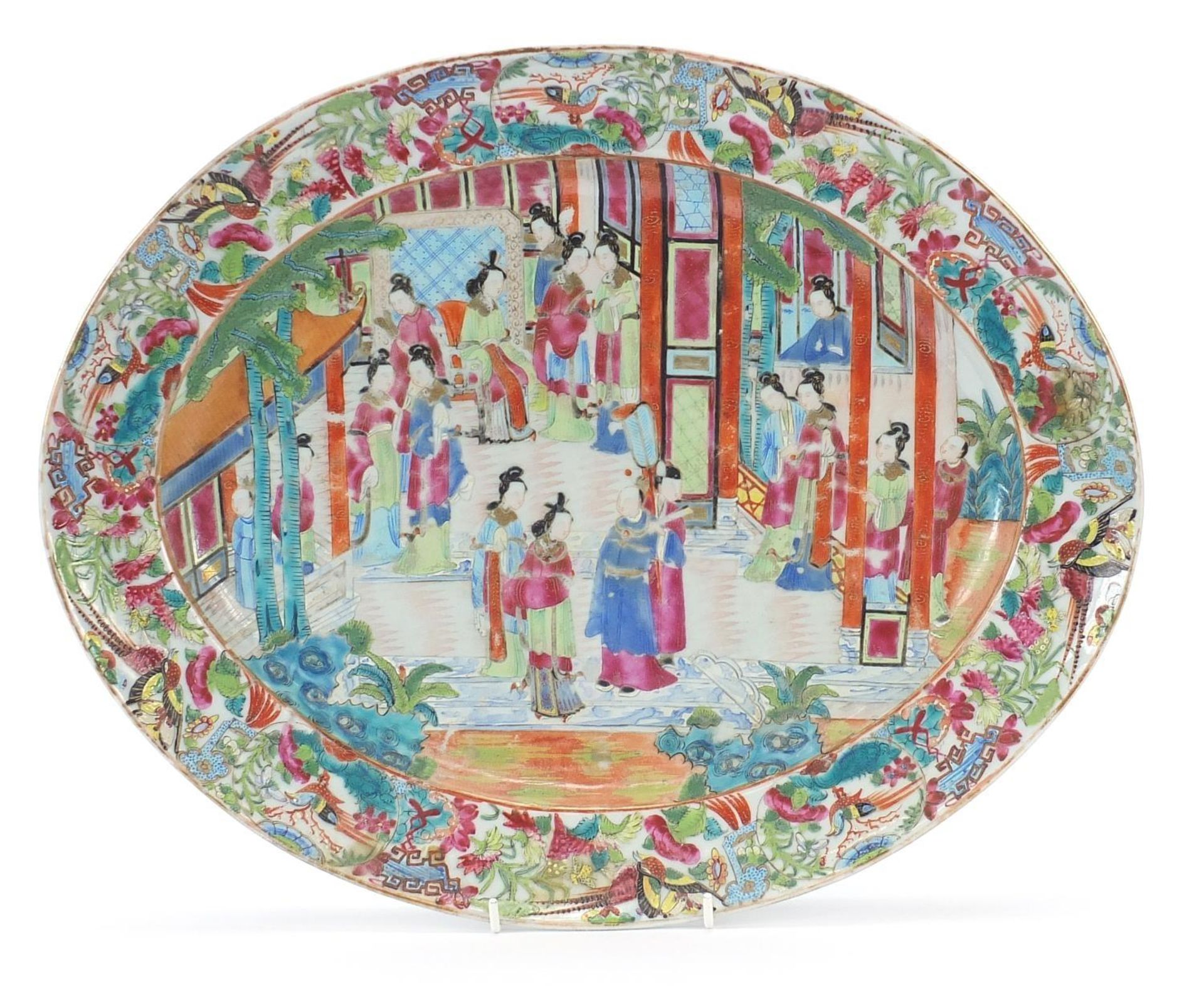 Chinese Canton porcelain platter finely hand painted in the famille rose palette with figures in a