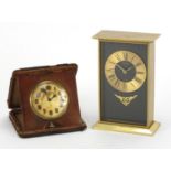 Swiza eight day desk clock and a leather cased travel clock, the largest 14.5cm high :