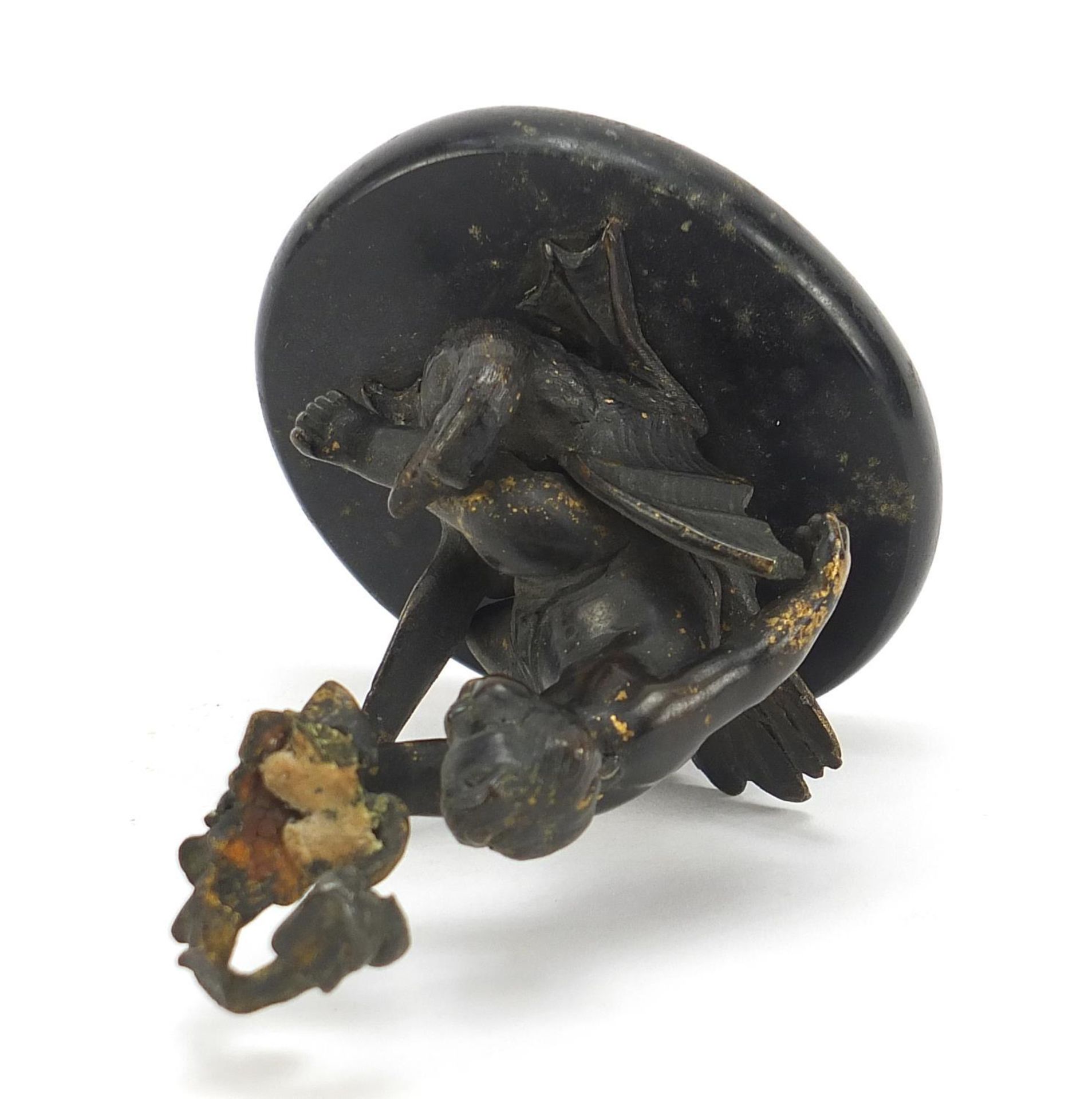 Cold painted bronze figure of Putti on a swan raised on an oval slate base, 11cm high : - Image 4 of 5