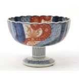 Japanese Imari pedestal bowl hand painted with flowers, 14cm high x 19cm in diameter :
