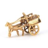 9ct gold horse drawn cart charm with rotating wheels, 2.5cm in length, 3.0g :
