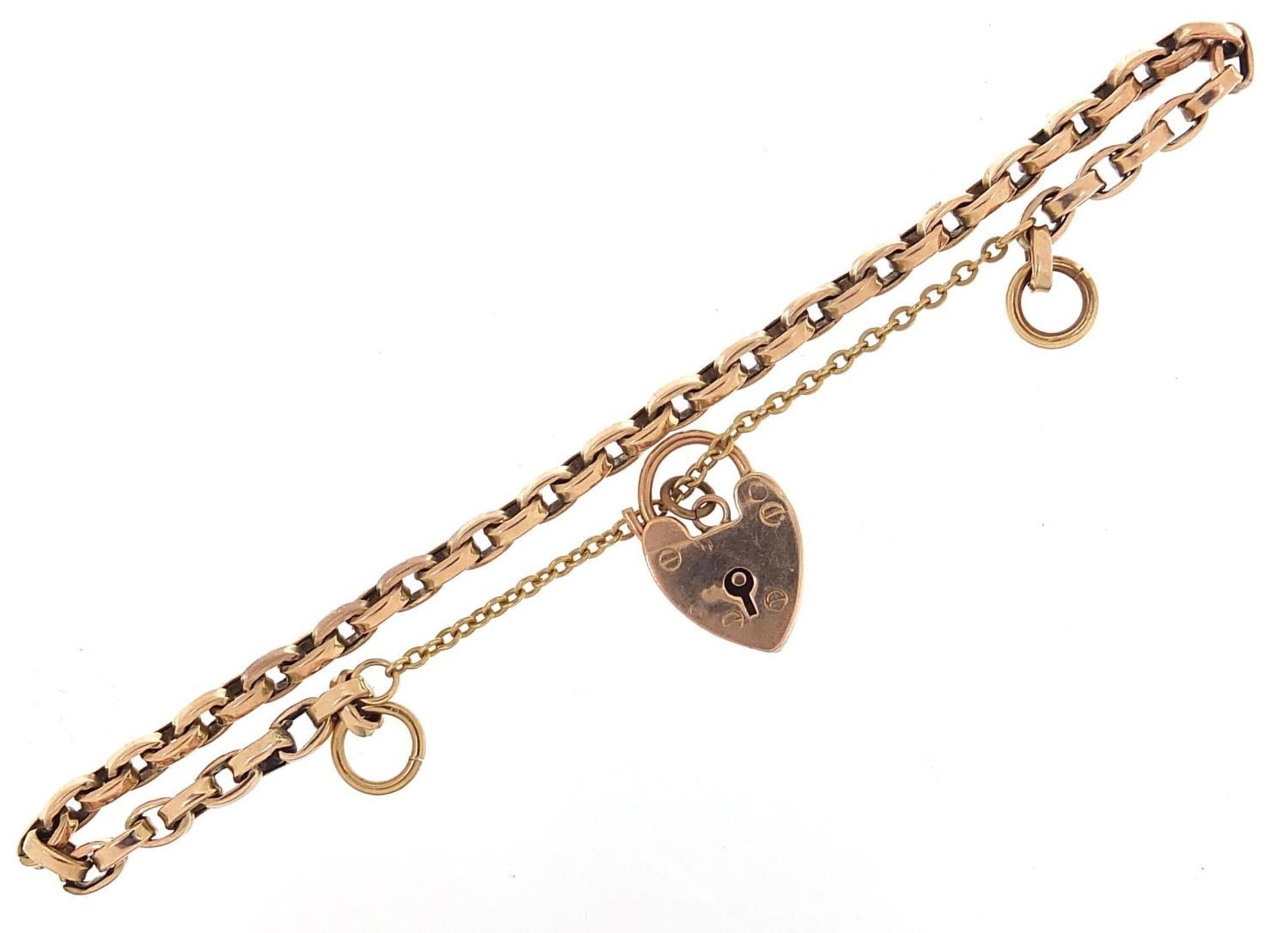 Unmarked gold bracelet, (tests as 9ct gold) with a 9ct gold loveheart padlock, 16cm in length, 7. - Image 2 of 4