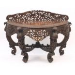 19th century Burmese hardwood demi lune hall table finely and deeply carved and pierced with animals