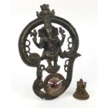 Indian bronze figure of Ganesh and a bronzed metal wall clock, the largest 50cm high :