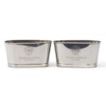 Pair of Champagne ice buckets with Lily Bollinger mottos, each 15.5cm H x 29.5cm W x 14.5cm D :