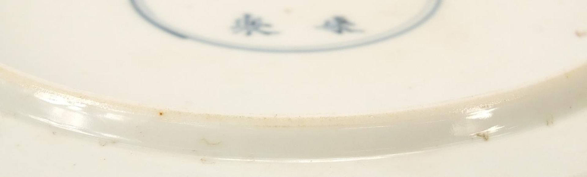 Chinese blue and white porcelain footed dish hand painted with fish amongst waves, six figure - Image 4 of 4