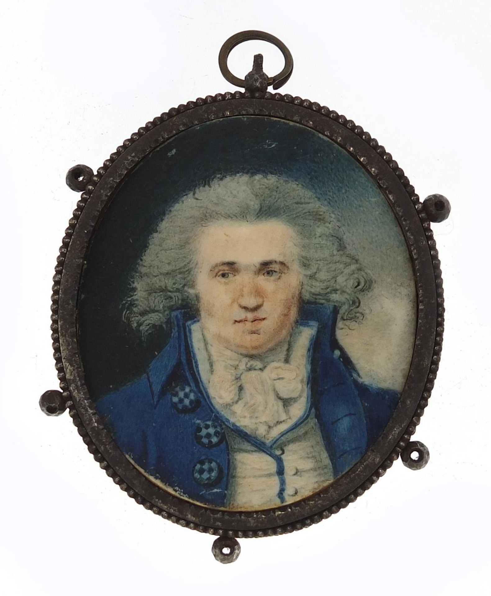 Georgian oval hand painted portrait miniature of a gentleman housed in a steel mourning pendant, the