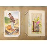 Edwardian and later postcards arranged in an album, including military interest silk, French silk