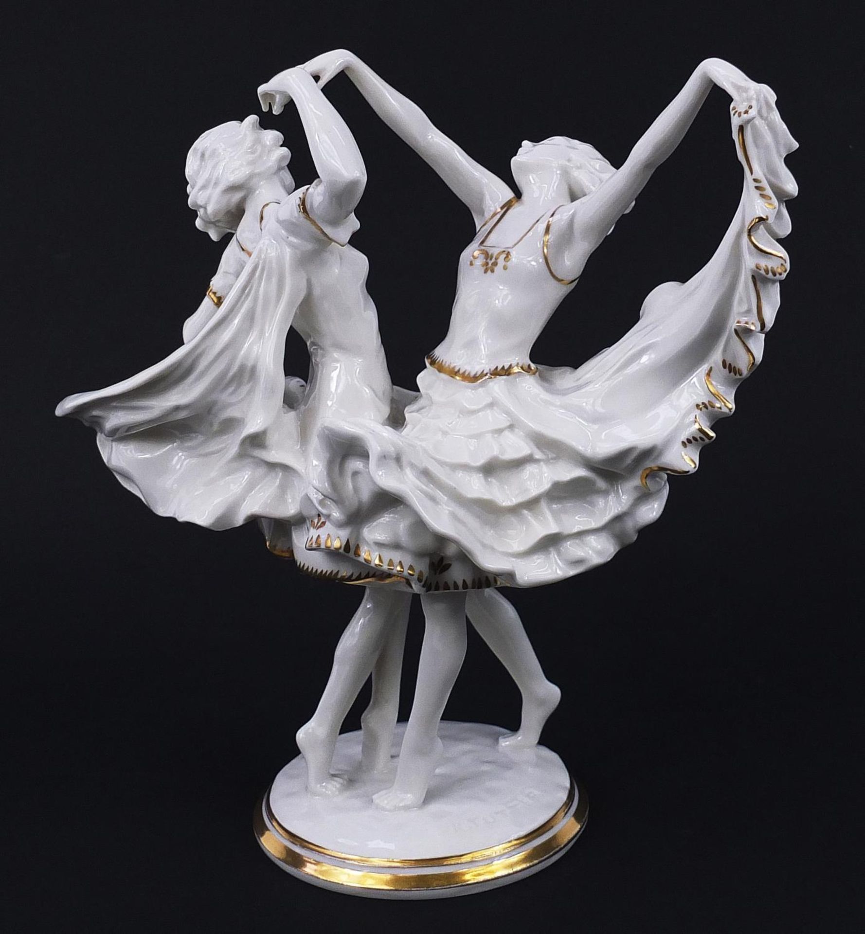 Karl Tutter for Hutschenreuther, German gilded porcelain figure of two dancers, 28.5cm high :