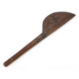 Tribal interest carved wooden paddle possibly Polynesian, 44cm in length :