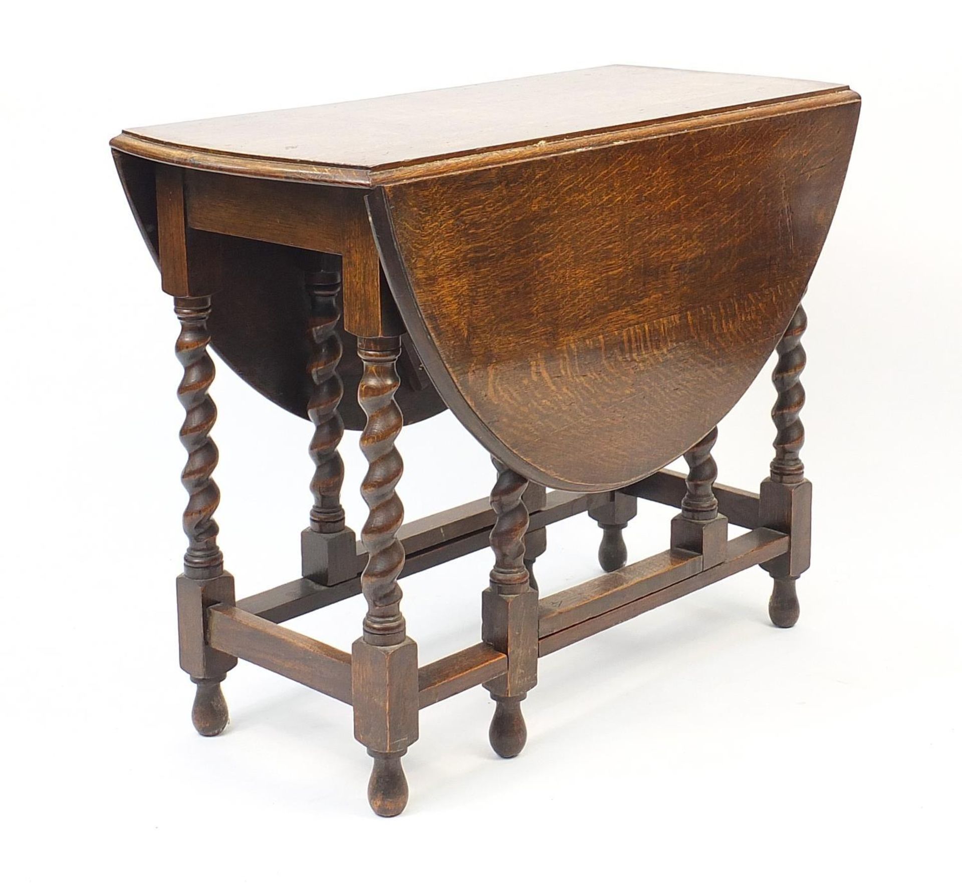 Oval oak gate leg table with barley twist legs, 73cm H x x 92cm W x 42cm D when closed :