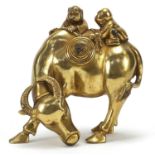 Chinese gilt bronze figure of two boys on a water buffalo, 14cm high :