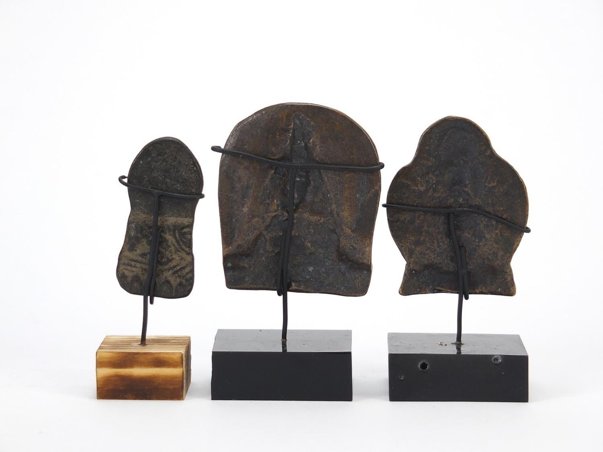 Three Nepalese patinated bronze plaques of Buddha with display stands, the largest 11cm high : - Image 6 of 10