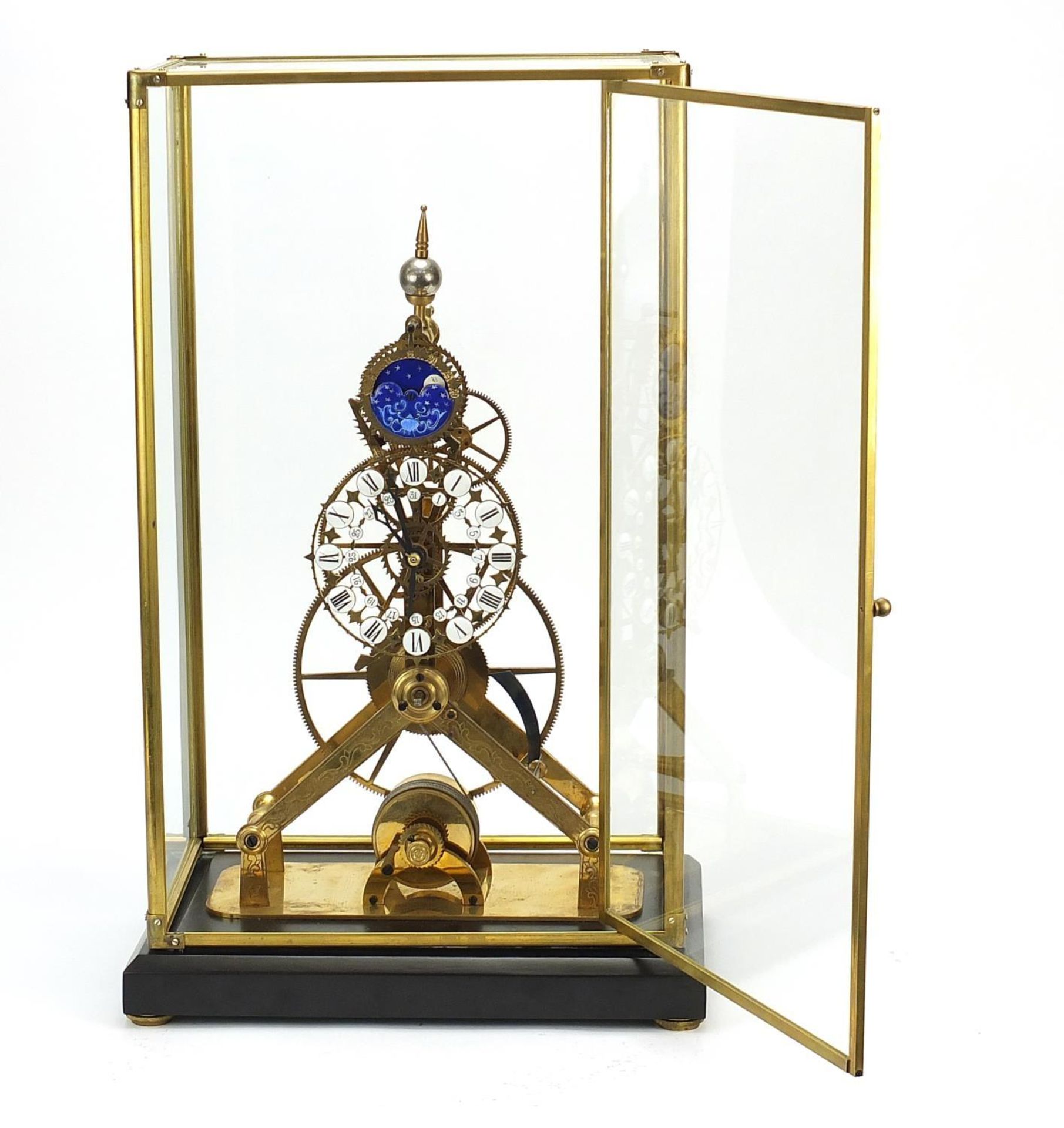 Gothic style brass skeleton clock with moon face dial and glass display case, with key and pendulum, - Image 5 of 6