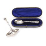 Silver christening spoon with fitted case and a Continental silver ladle with Putti handle, the