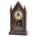 Gothic style American faux rosewood striking mantle clock with Roman numerals, 52cm high :