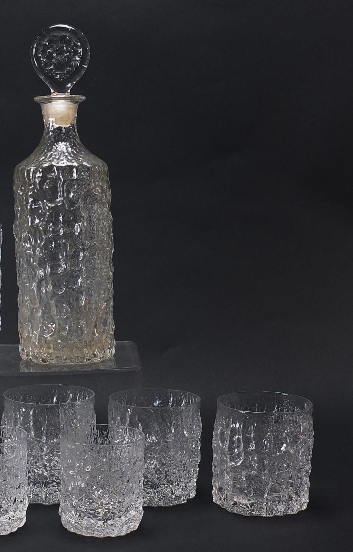 Geoffrey Baxter for Whitefriars, textured glassware comprising two decanters, set of six tumbles and - Image 3 of 4