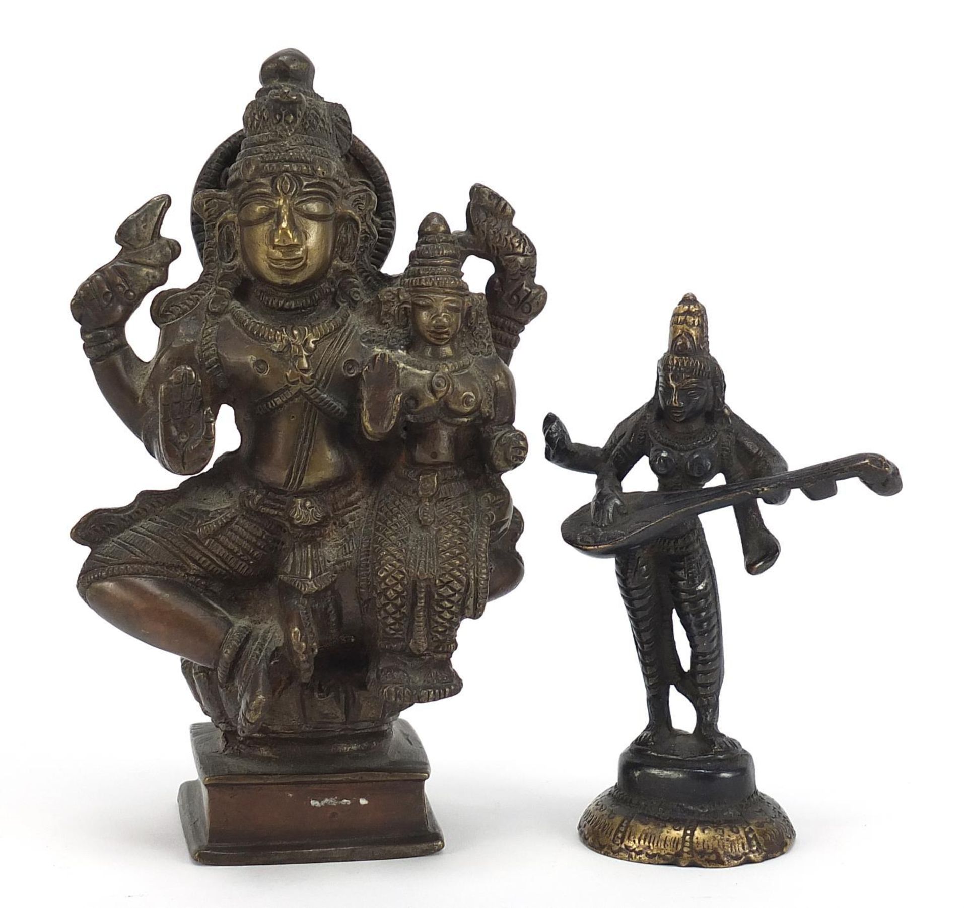 Two Indian patinated bronze votive figures, the largest 16.5cm high :