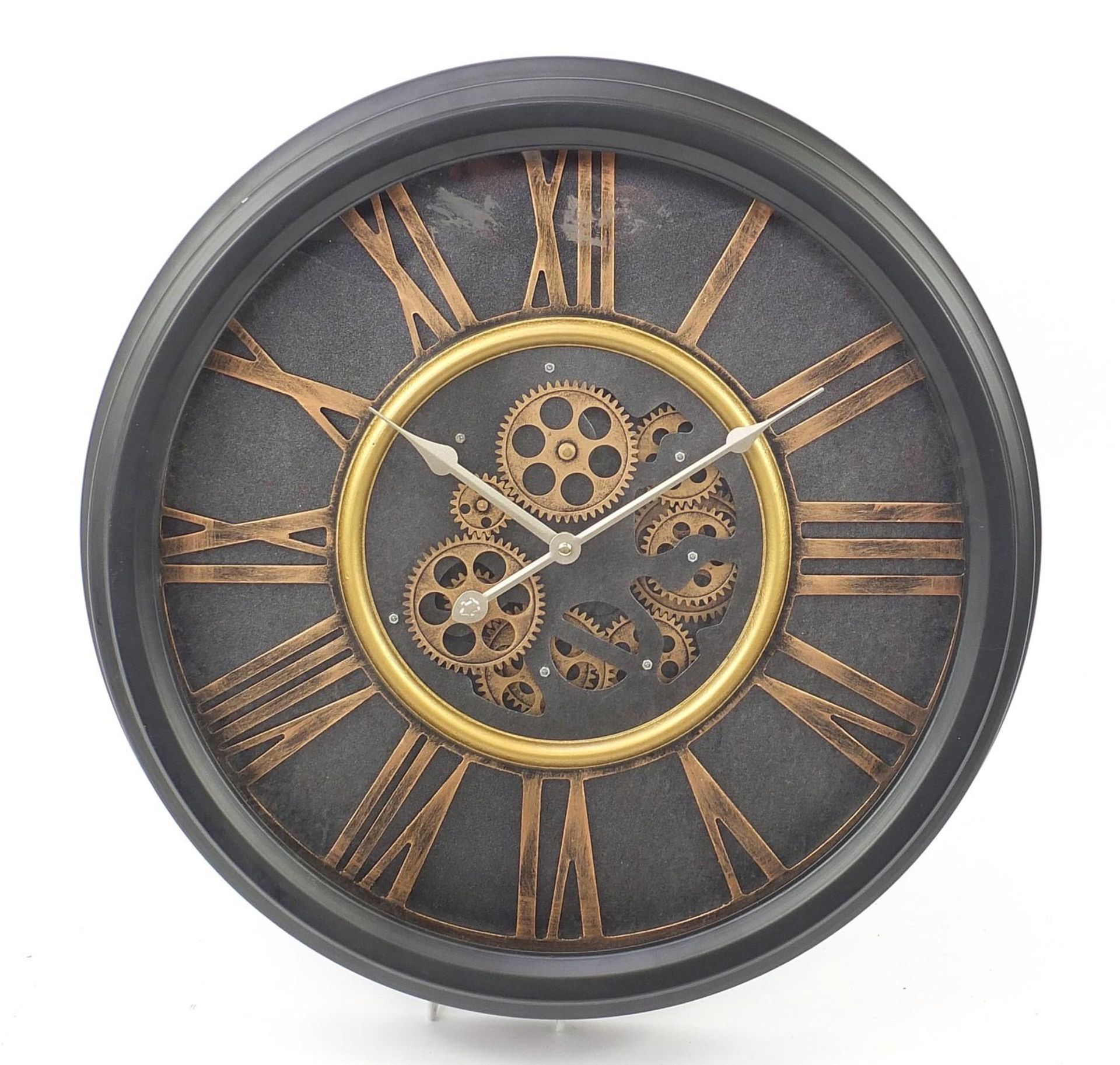 Modernist skeleton design wall clock with Roman numerals, 52cm in diameter :