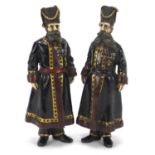 Pair of cold painted bronze figures of Russian officers in military dress, each approximately 18cm