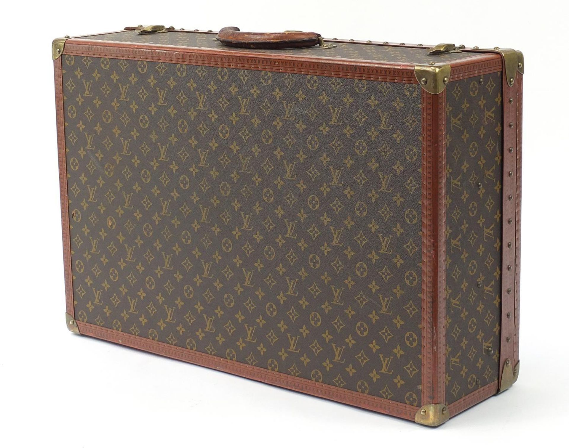 Louis Vuitton, early 20th century suitcase with lift out tray, various impressed marks to the - Image 5 of 8