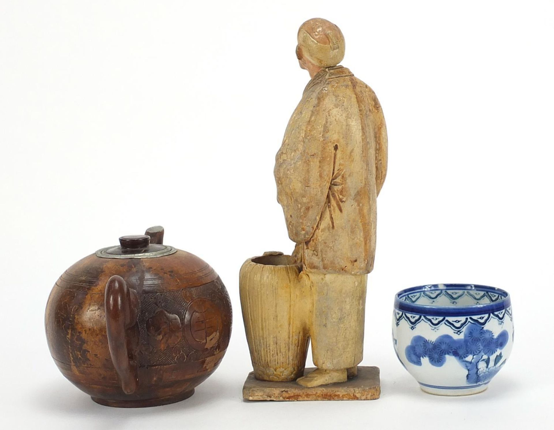 Oriental objects including a carved wood teapot and pottery figure of a man holding a peach, the - Image 4 of 9