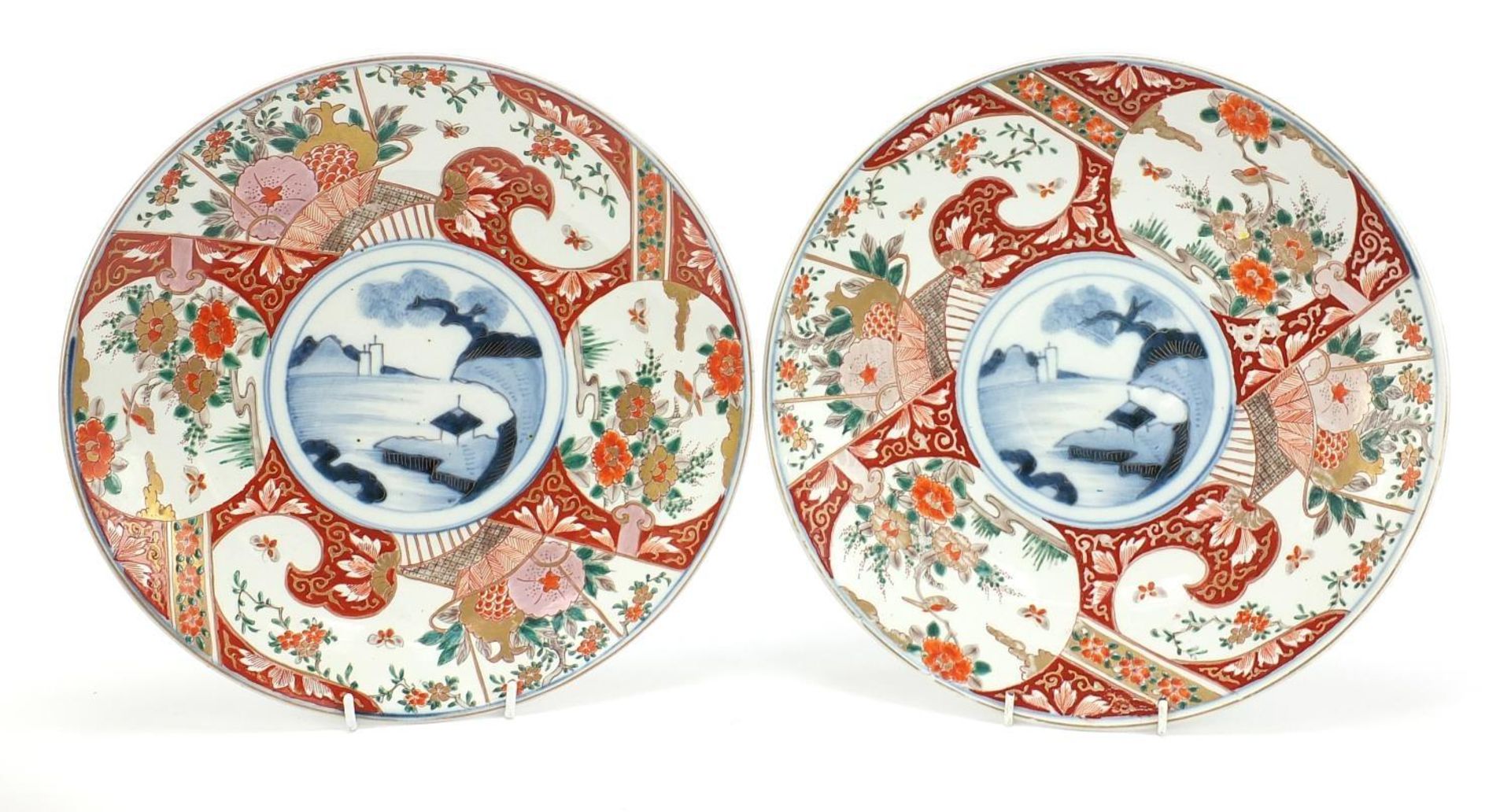 Japanese Imari comprising a pair of chargers hand painted with flowers and landscapes and a bowl, - Image 2 of 11