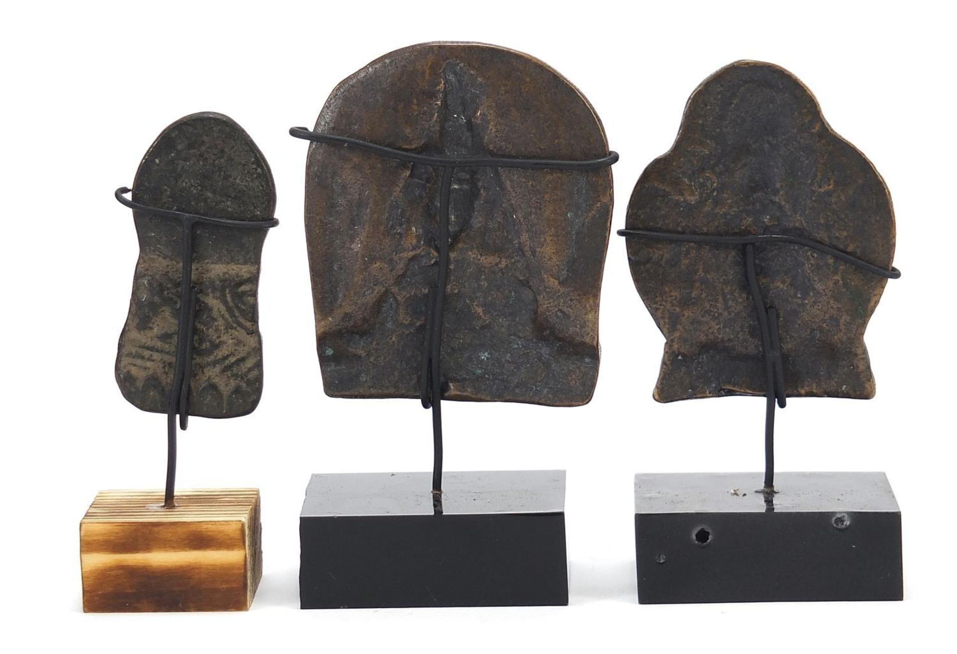 Three Nepalese patinated bronze plaques of Buddha with display stands, the largest 11cm high : - Image 10 of 10