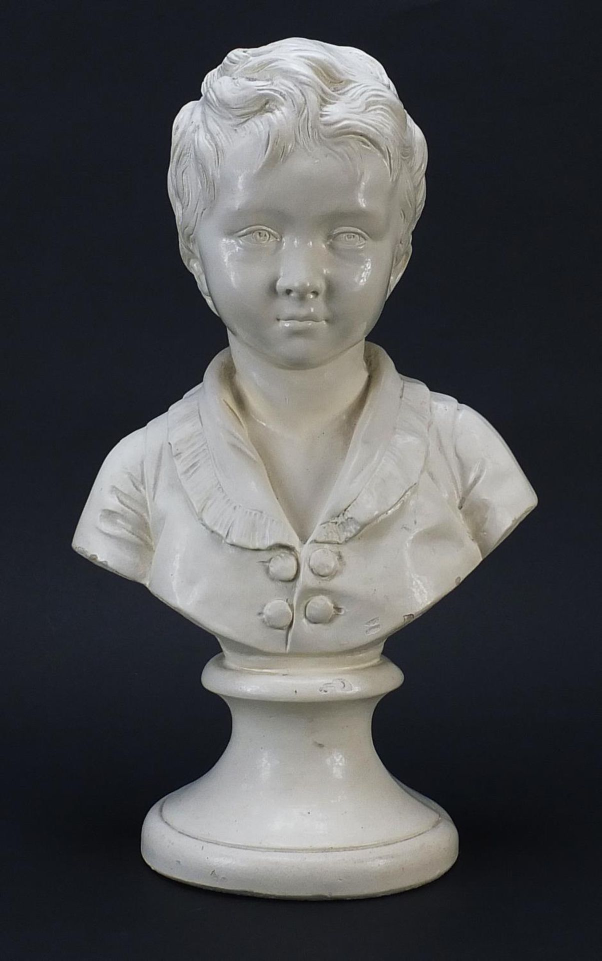 Antique style plaster bust of a young boy, 42cm high :
