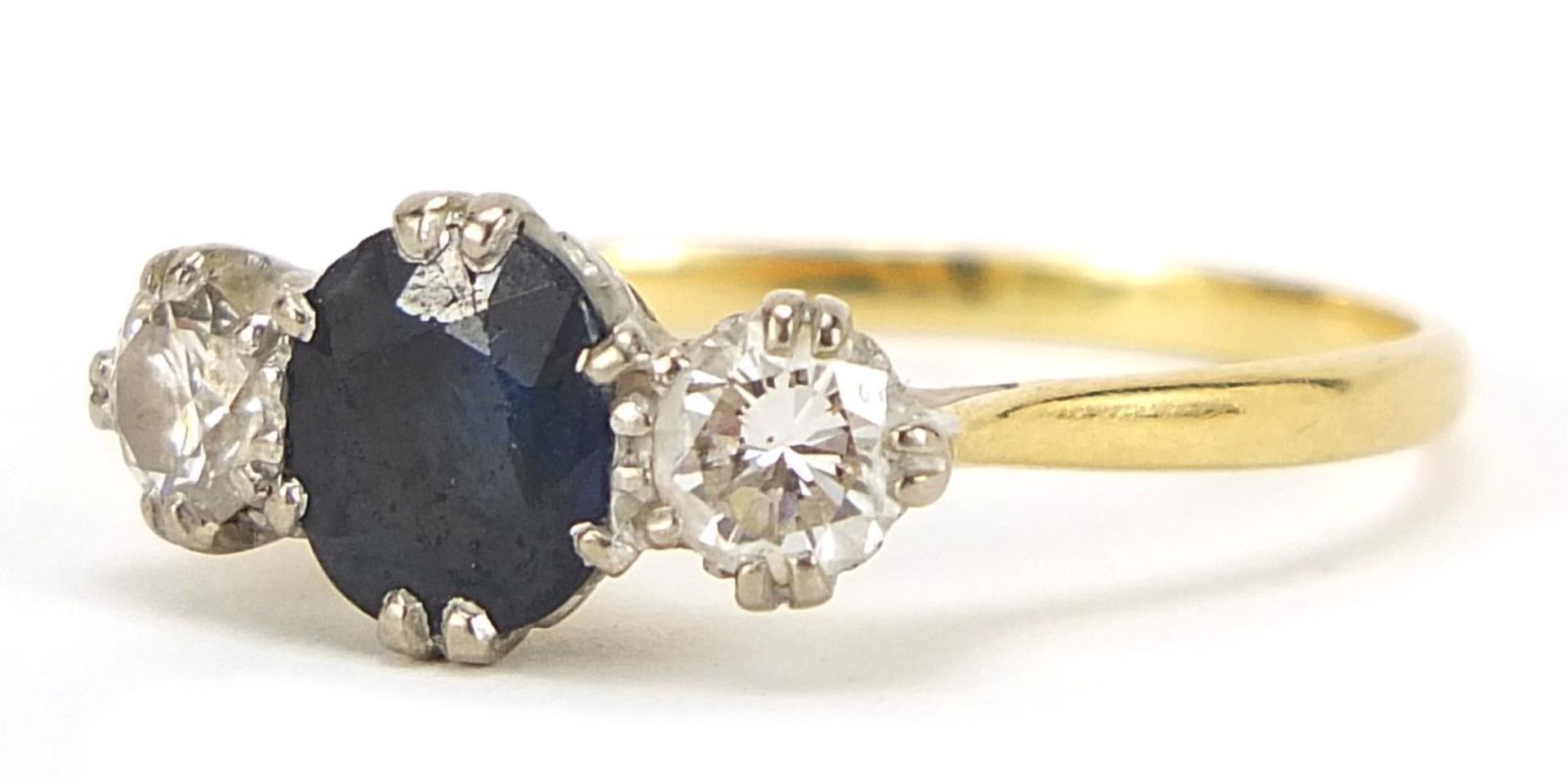 Unmarked gold, sapphire and diamond three stone ring, the sapphire approximately 7mm x 6mm, the - Image 2 of 4