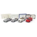 Four Franklin Mint die cast precision model vehicles including 1954 Mercedes Benz W196R and 1985