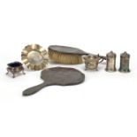 Silver items including three piece cruet with blue glass liners, mustard on stand and silver